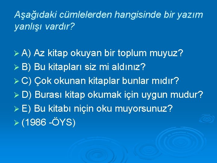 Aşağıdaki cümlelerden hangisinde bir yazım yanlışı vardır? Ø A) Az kitap okuyan bir toplum