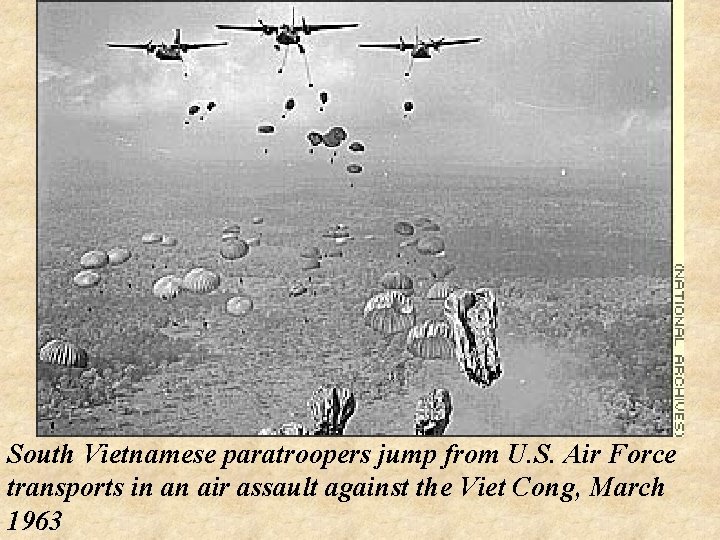 South Vietnamese paratroopers jump from U. S. Air Force transports in an air assault