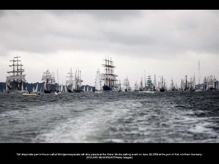 Tall ships take part in the so-called Windjammerparade tall ship parade at the Kieler