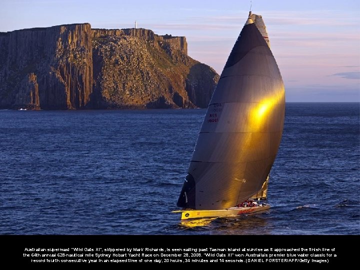 Australian supermaxi "Wild Oats XI", skippered by Mark Richards, is seen sailing past Tasman