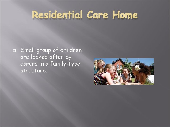 Residential Care Home Small group of children are looked after by carers in a