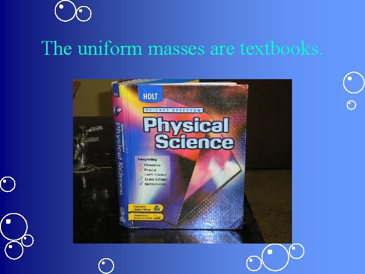 The uniform masses are textbooks. 