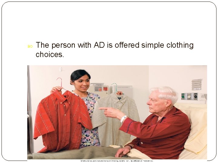  The person with AD is offered simple clothing choices. Slide 33 