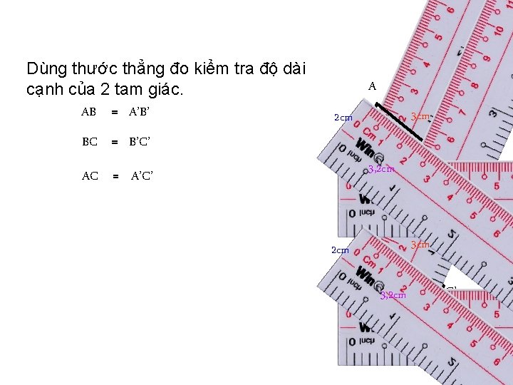 Dùng thước thẳng đo kiểm tra độ dài cạnh của 2 tam giác. AB