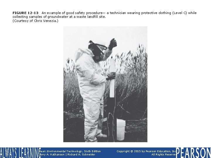 FIGURE 12 -13 An example of good safety procedure— a technician wearing protective clothing