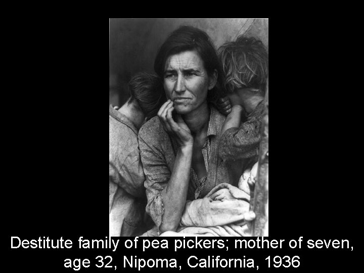 Destitute family of pea pickers; mother of seven, age 32, Nipoma, California, 1936 