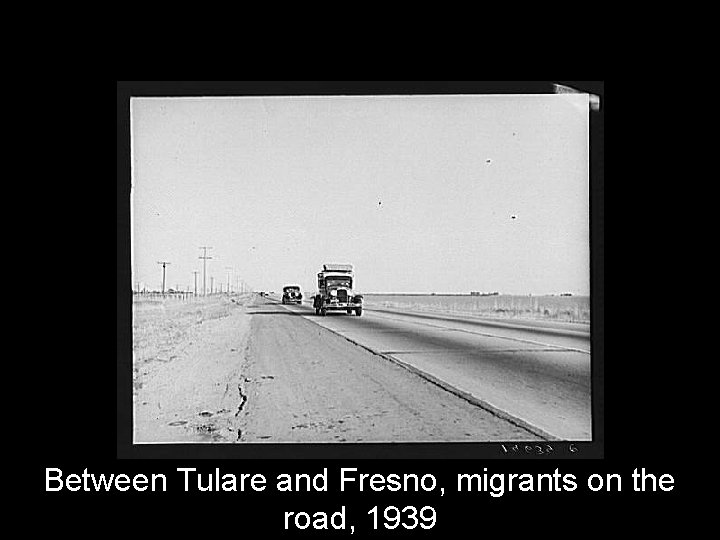 Between Tulare and Fresno, migrants on the road, 1939 