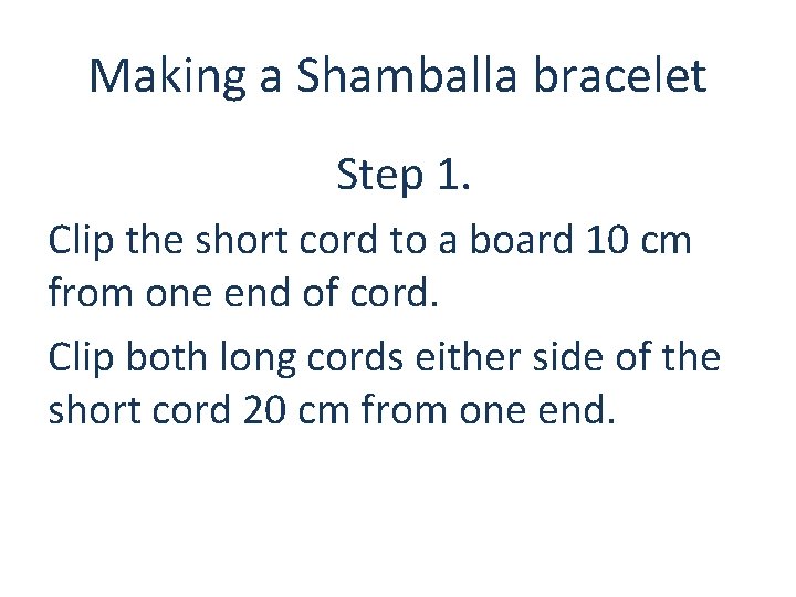 Making a Shamballa bracelet Step 1. Clip the short cord to a board 10