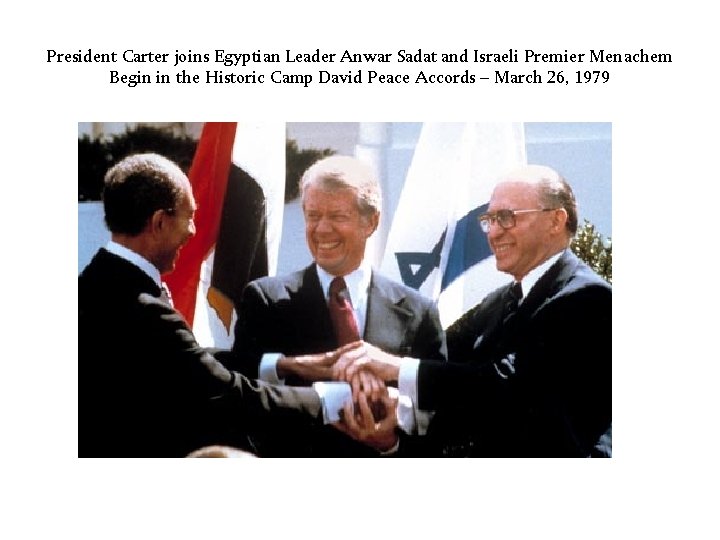 President Carter joins Egyptian Leader Anwar Sadat and Israeli Premier Menachem Begin in the