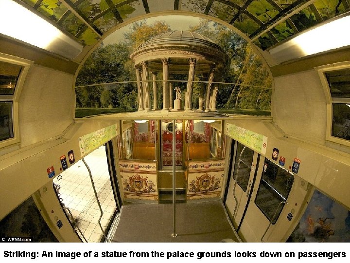 Striking: An image of a statue from the palace grounds looks down on passengers