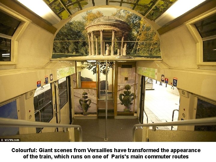 Colourful: Giant scenes from Versailles have transformed the appearance of the train, which runs