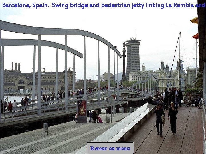 Barcelona, Spain. Swing bridge and pedestrian jetty linking La Rambla and Retour au menu