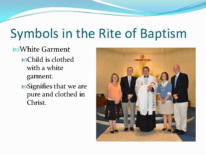 Symbols in the Rite of Baptism White Garment Child is clothed with a white