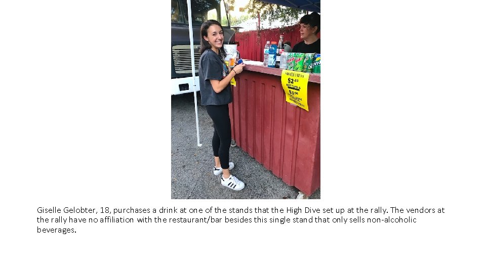 Giselle Gelobter, 18, purchases a drink at one of the stands that the High