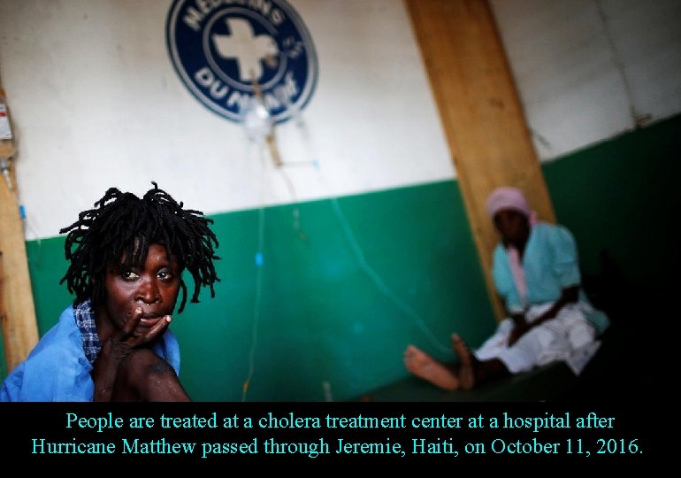 People are treated at a cholera treatment center at a hospital after Hurricane Matthew