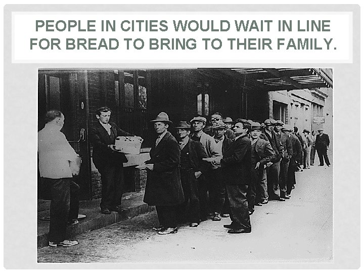 PEOPLE IN CITIES WOULD WAIT IN LINE FOR BREAD TO BRING TO THEIR FAMILY.