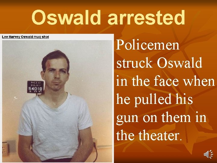 Oswald arrested Policemen struck Oswald in the face when he pulled his gun on