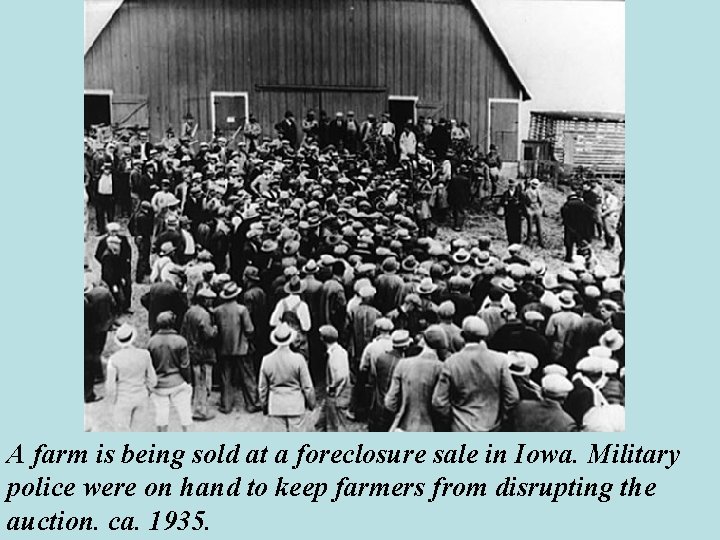 A farm is being sold at a foreclosure sale in Iowa. Military police were