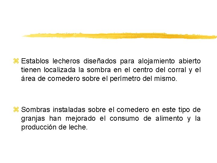 z Establos lecheros diseñados para alojamiento abierto tienen localizada la sombra en el centro