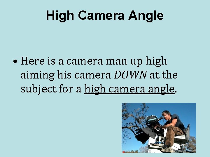 High Camera Angle • Here is a camera man up high aiming his camera