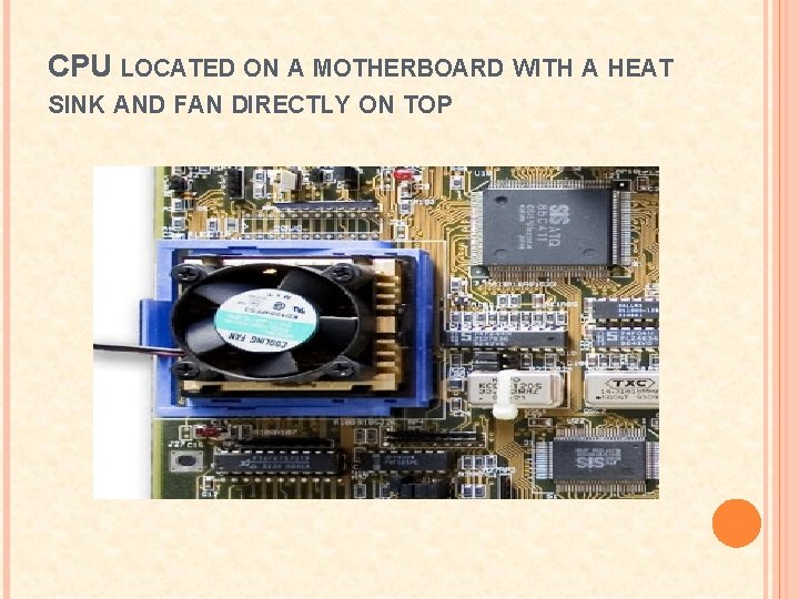 CPU LOCATED ON A MOTHERBOARD WITH A HEAT SINK AND FAN DIRECTLY ON TOP