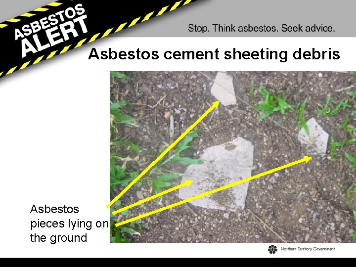 Asbestos cement sheeting debris Asbestos pieces lying on the ground 