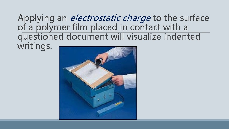 Applying an electrostatic charge to the surface of a polymer film placed in contact