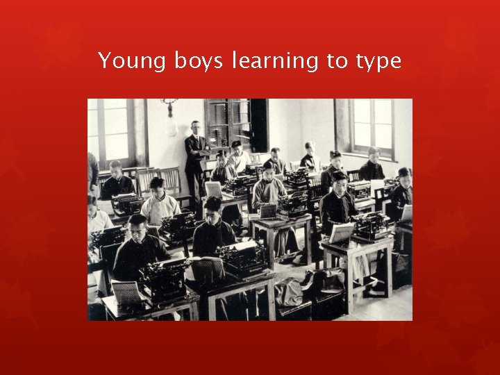 Young boys learning to type 