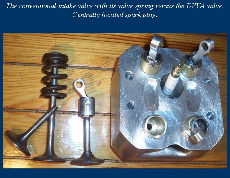 The conventional intake valve with its valve spring versus the DVVA valve. Centrally located