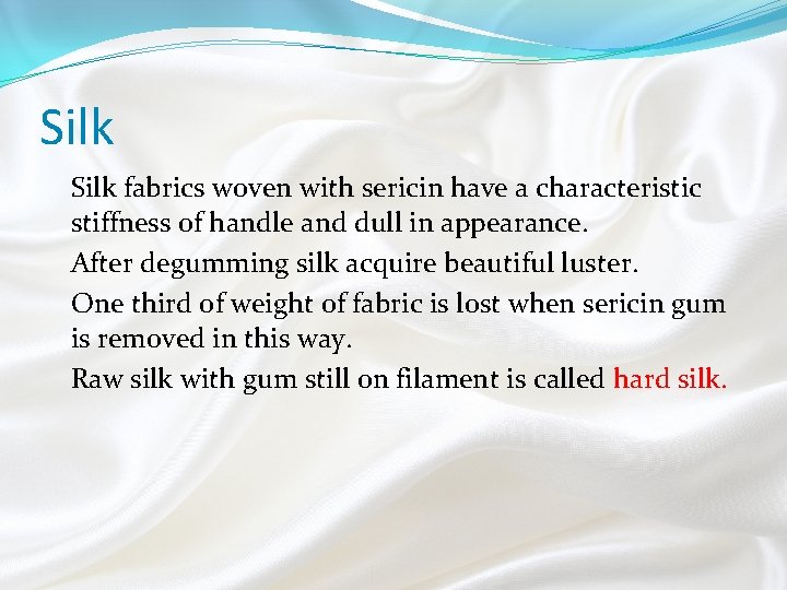 Silk fabrics woven with sericin have a characteristic stiffness of handle and dull in