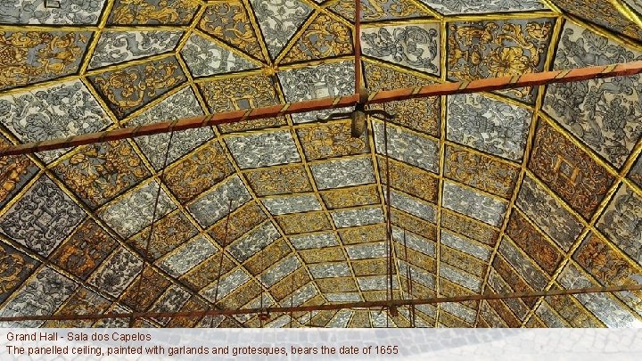 Grand Hall - Sala dos Capelos The panelled ceiling, painted with garlands and grotesques,