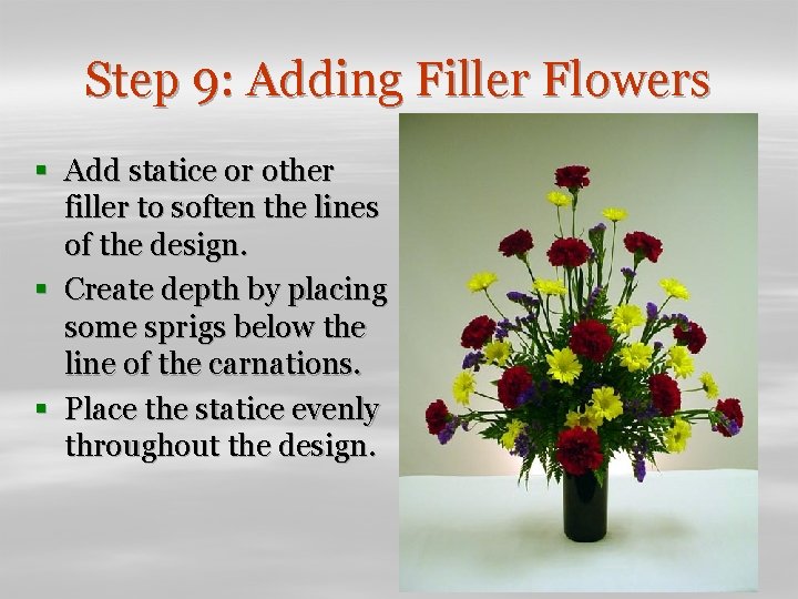 Step 9: Adding Filler Flowers § Add statice or other filler to soften the