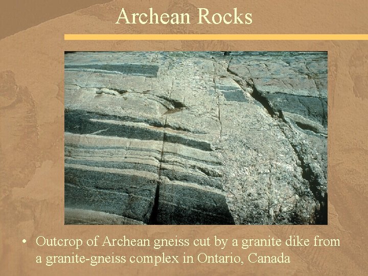 Archean Rocks • Outcrop of Archean gneiss cut by a granite dike from a