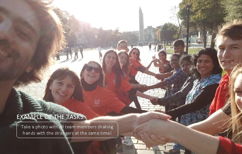 EXAMPLE OF THE TASKS Take a photo with all team members shaking hands with