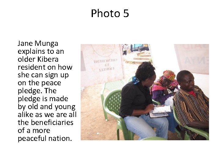 Photo 5 Jane Munga explains to an older Kibera resident on how she can