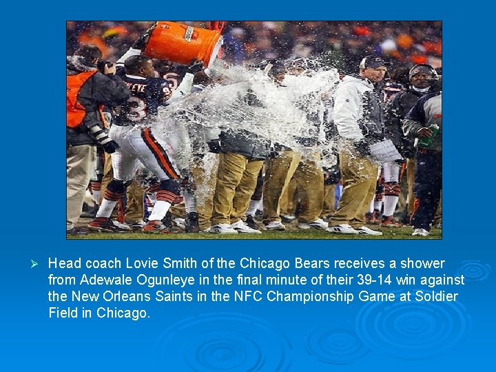 Ø Head coach Lovie Smith of the Chicago Bears receives a shower from Adewale