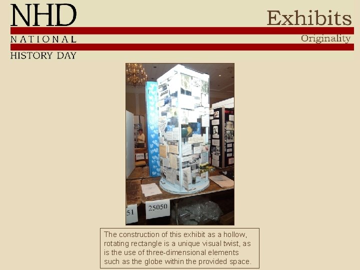 The construction of this exhibit as a hollow, rotating rectangle is a unique visual