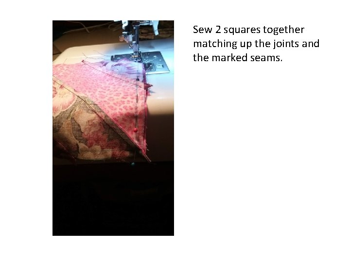 Sew 2 squares together matching up the joints and the marked seams. 