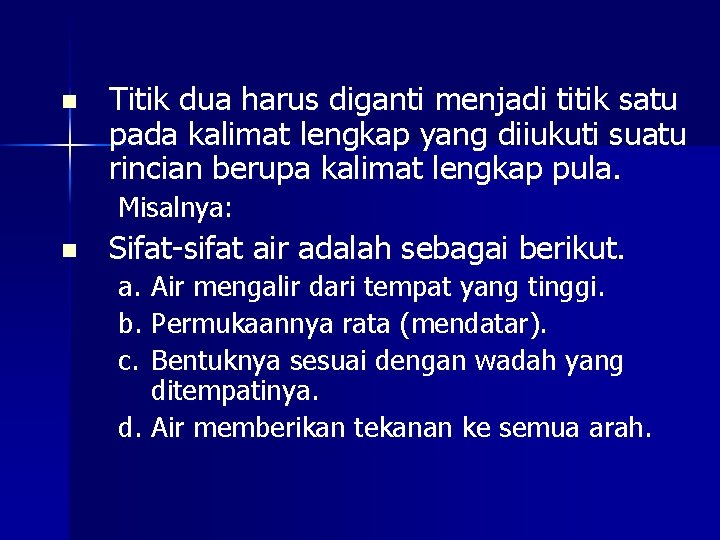 n Titik dua harus diganti menjadi titik satu pada kalimat lengkap yang diiukuti suatu
