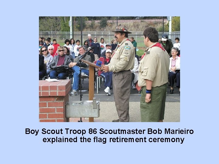 Boy Scout Troop 86 Scoutmaster Bob Marieiro explained the flag retirement ceremony 