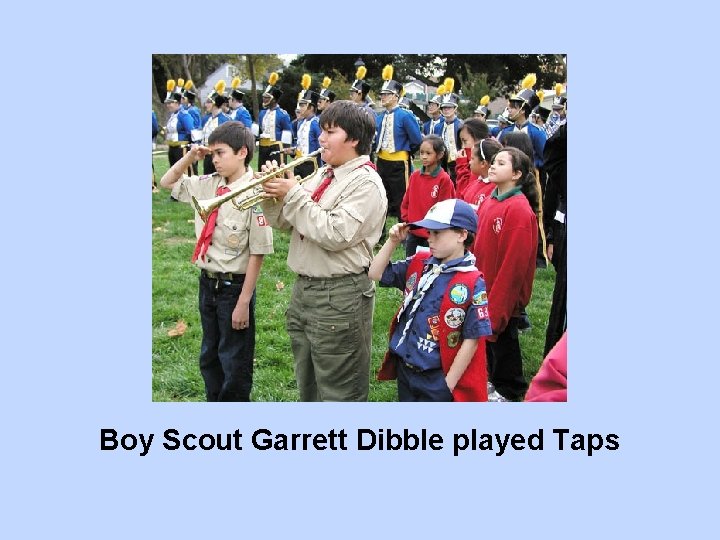 Boy Scout Garrett Dibble played Taps 