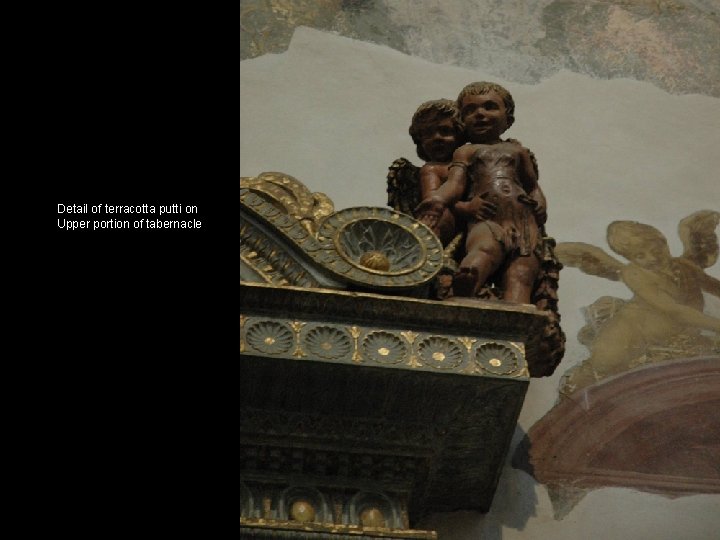 Detail of terracotta putti on Upper portion of tabernacle 