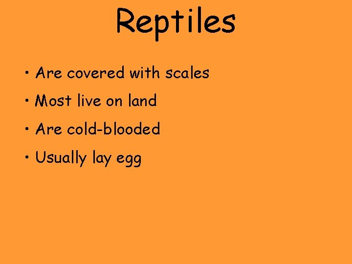 Reptiles • Are covered with scales • Most live on land • Are cold-blooded