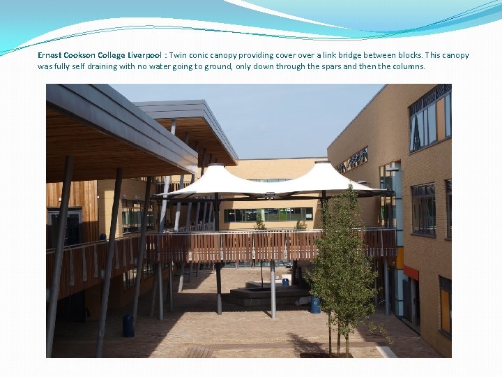 Ernest Cookson College Liverpool : Twin conic canopy providing cover a link bridge between