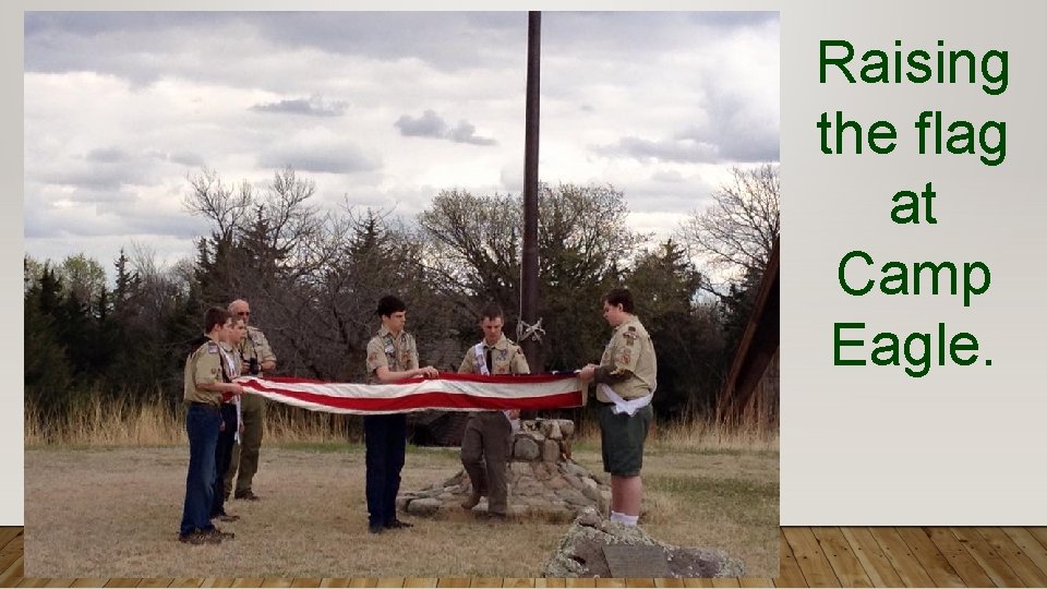 Raising the flag at Camp Eagle. 