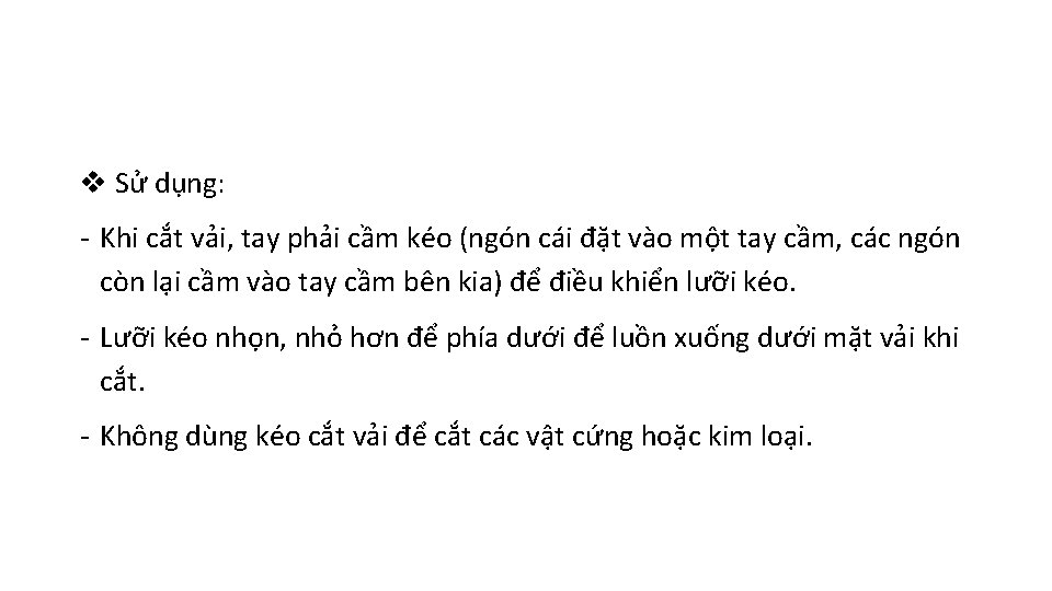 v Sử dụng: - Khi cắt vải, tay phải cầm kéo (ngón cái đặt