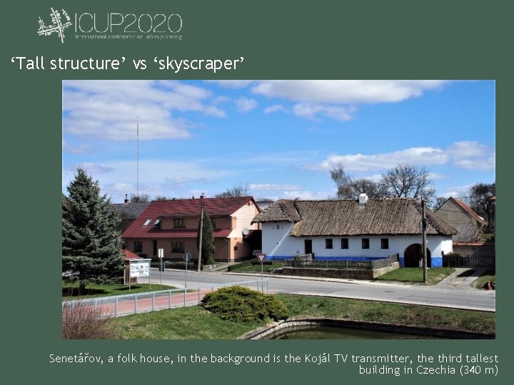 ‘Tall structure’ vs ‘skyscraper’ Senetářov, a folk house, in the background is the Kojál