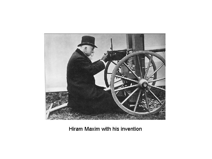 Hiram Maxim with his invention 