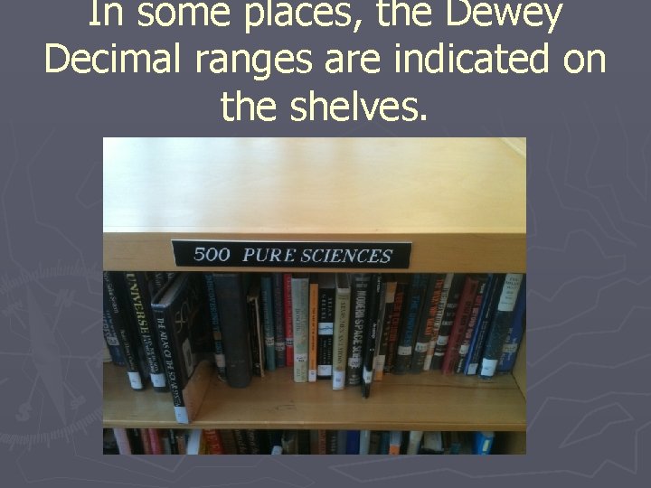 In some places, the Dewey Decimal ranges are indicated on the shelves. 