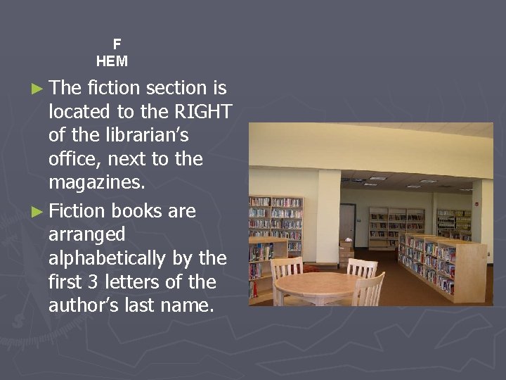 F HEM ► The fiction section is located to the RIGHT of the librarian’s